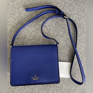 Kate spade - beautiful blue mini purse with striped interior.